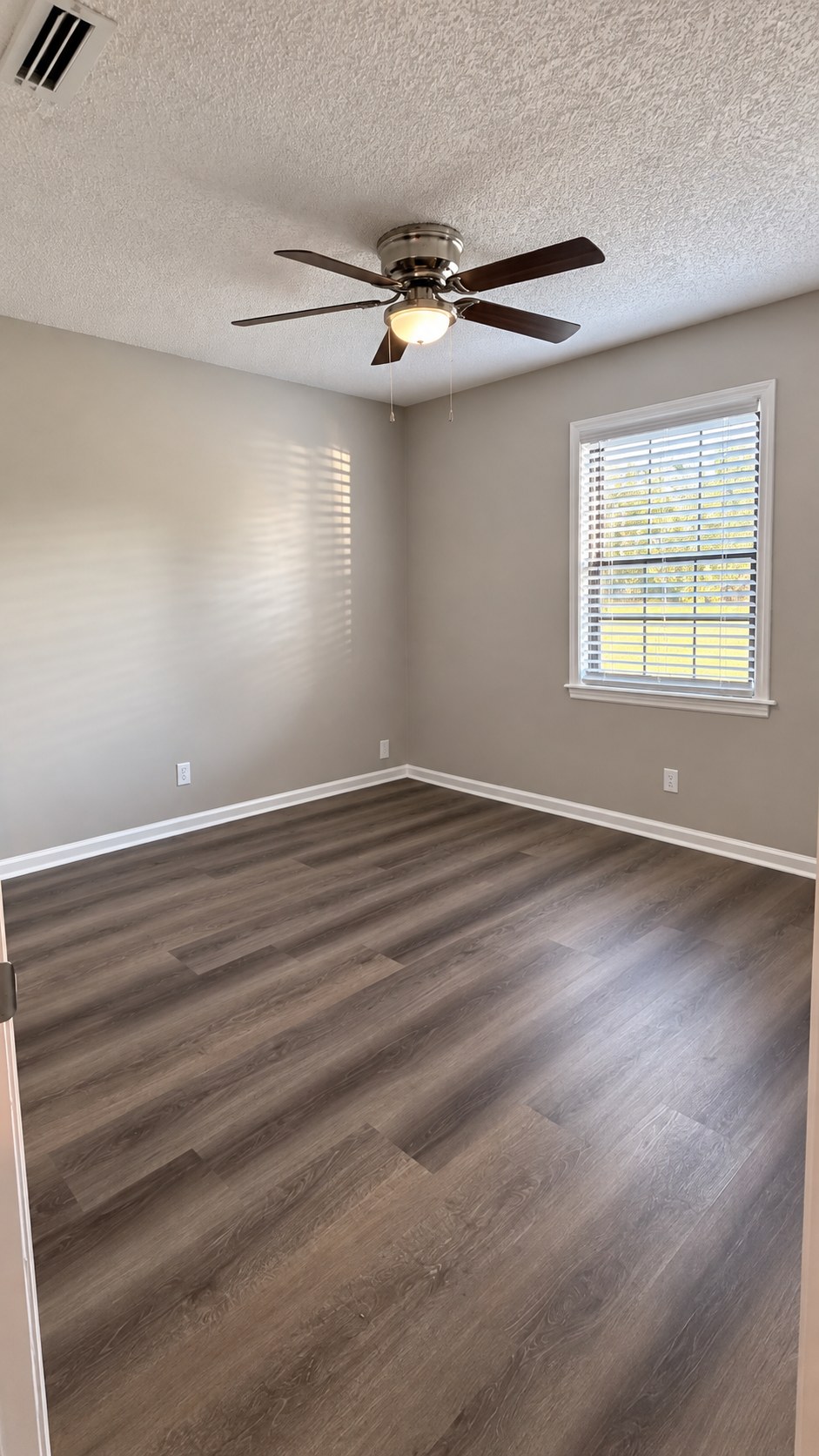 Luxury Vinyl Plank Flooring and Baseboard Trim Installation